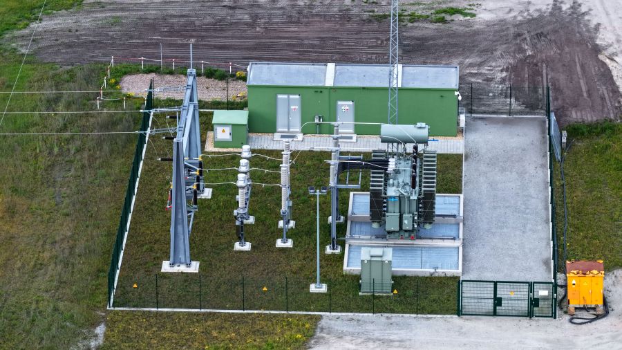 Aerial View of Electrical Substation in Rural Green Landscape